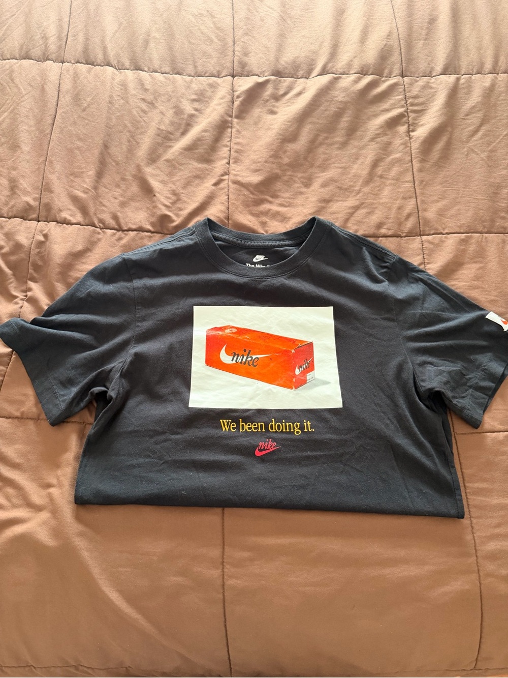 Nike Black Tee with Orange Shoebox Graphic and Yellow Text